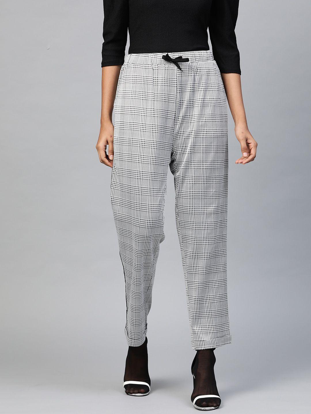 sassafras women white & black regular fit self-checked cropped trousers