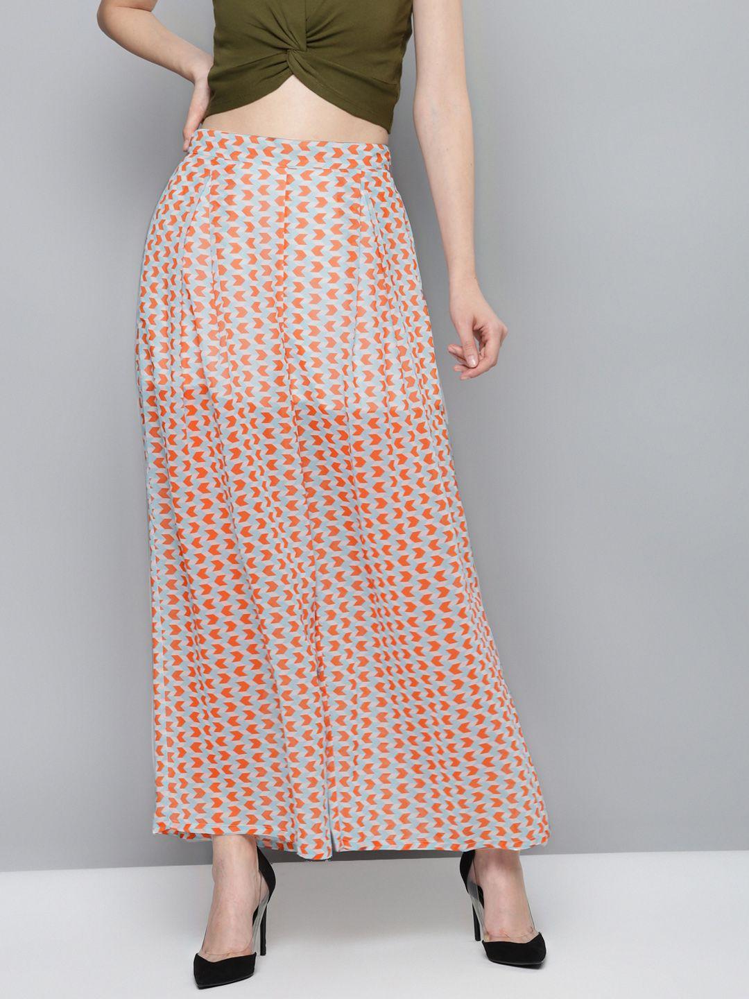 sassafras women white & orange regular fit printed parallel trousers