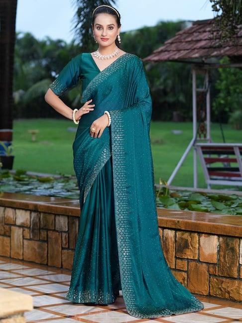 satrani teal blue embellished saree with unstitched blouse