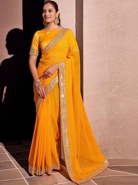satrani yellow embellished saree with unstitched blouse