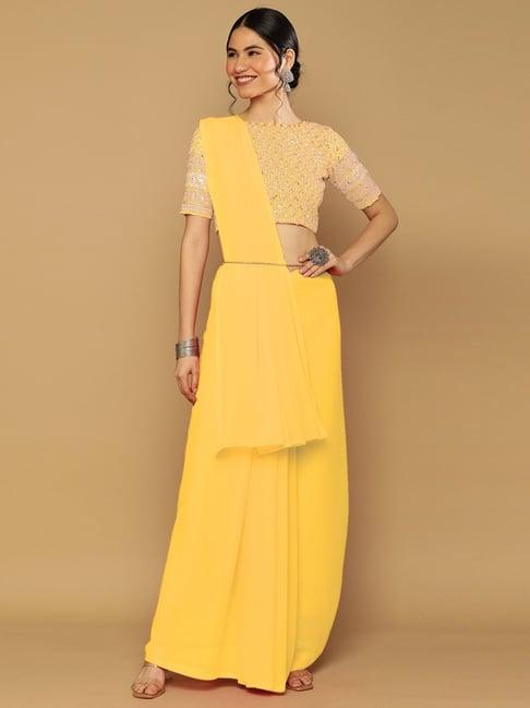 satrani yellow plain saree with unstitched blouse