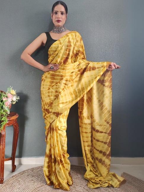 satrani yellow printed saree with unstitched blouse