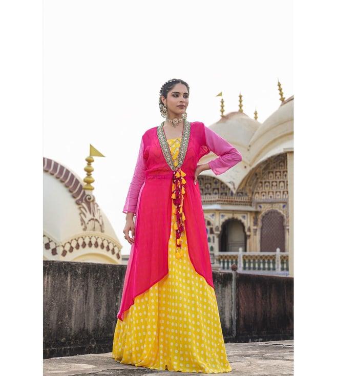 scakhi yellow bemberg muslin polka dots lehenga and choli with organza embellished cape