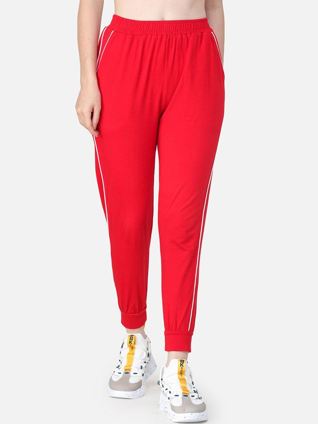 scorpius women red solid cotton track pants