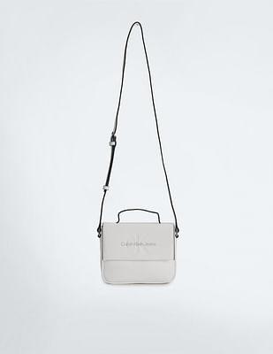 sculpted boxy flap sling bag