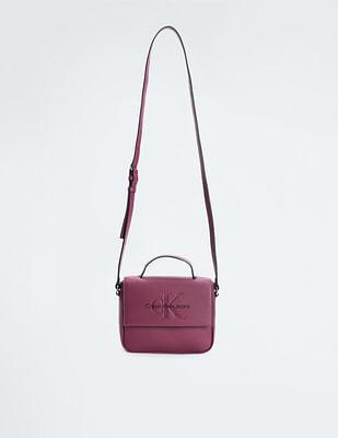 sculpted monogram boxy sling bag