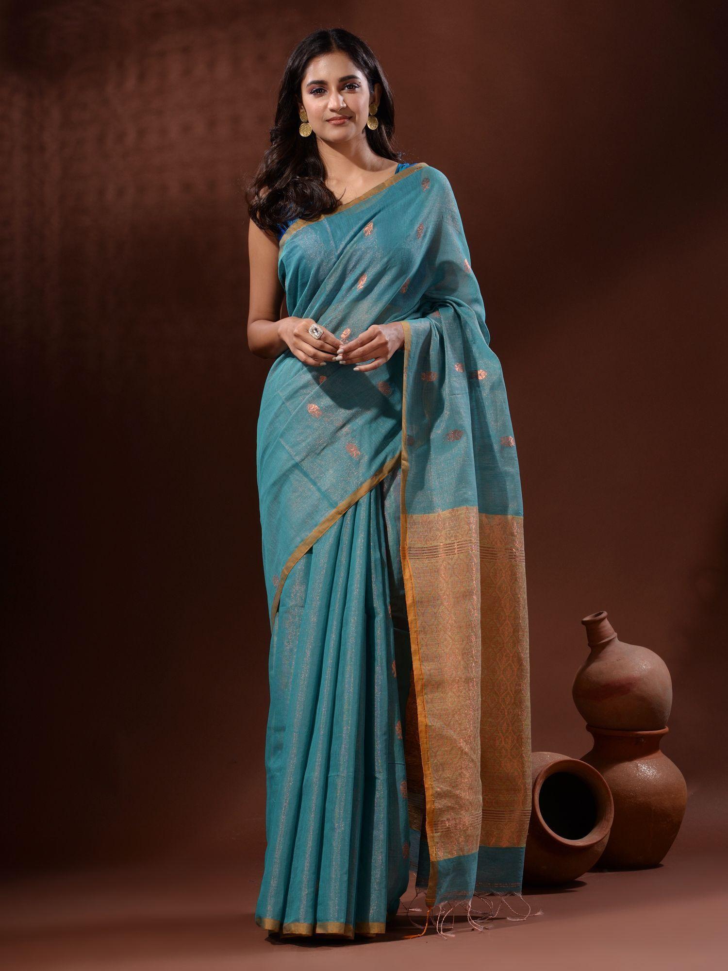 sea green tissue saree with fish motifs and contrast pallu with unstitched blouse