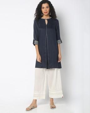 self-design tunic with roll-tab sleeves