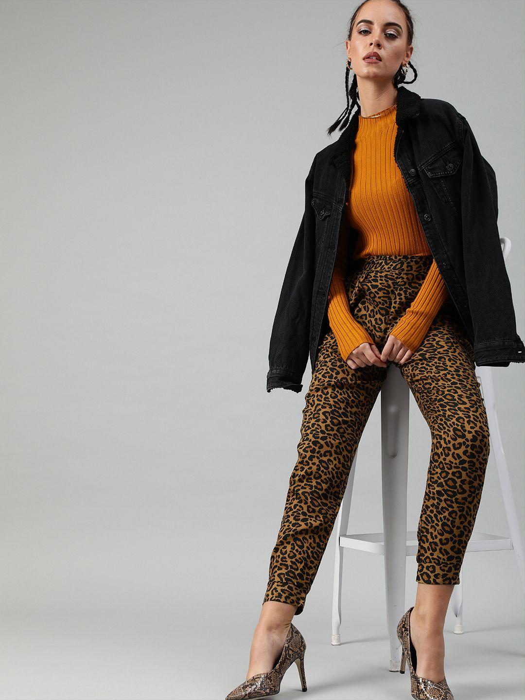 sera brown & black tiger print pleated tapered trousers