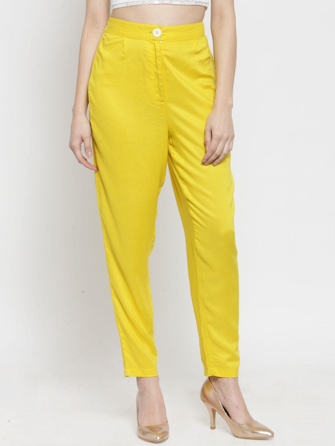 sera women yellow tapered fit solid cigarette trousers
