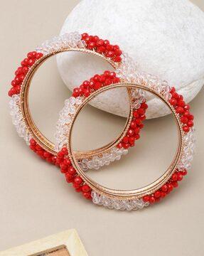 set of  2 gold-plated transparent beaded bracelets