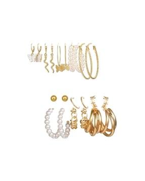 set of 11 gold-plated hoop earrings