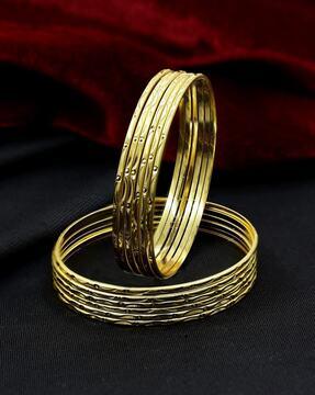 set of 12 gold-plated bangles