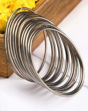 set of 12 silver-plated slip-on bangles