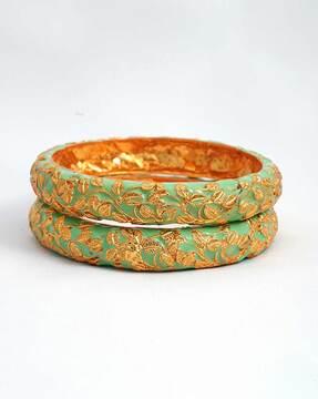 set of 2 gold-plated leaf bangles