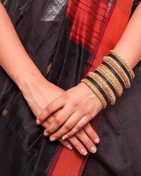 set of 2 stone-studded metal bangles