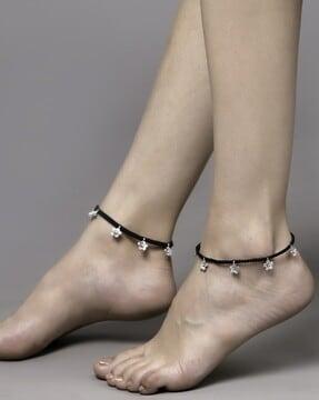 set of 2 threaded oxidised floral charm adjustable anklets
