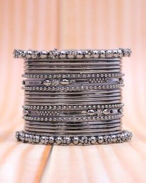 set of 20 silver-plated slip-on thin bangles