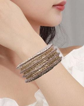 set of 4 diamond-studded broad bangles