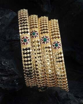 set of 4 gold-plated slip-on bangles