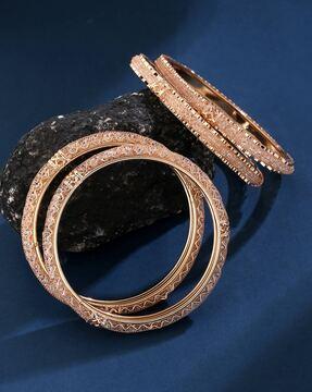 set of 4 rose gold-plated stone-studded bangles
