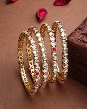 set of 4 women gold-plated stone-studded bangles