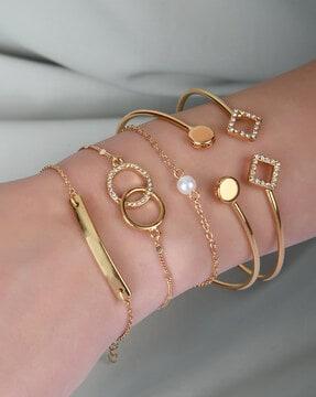 set of 5 stone studded gold-plated bracelet & cuffs