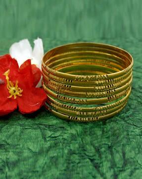 set of 8 gold-plated bangles