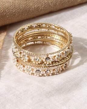 set of 9 gold-plated stone-studded bangles