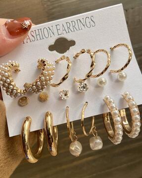 set of 9 gold-toned earrings