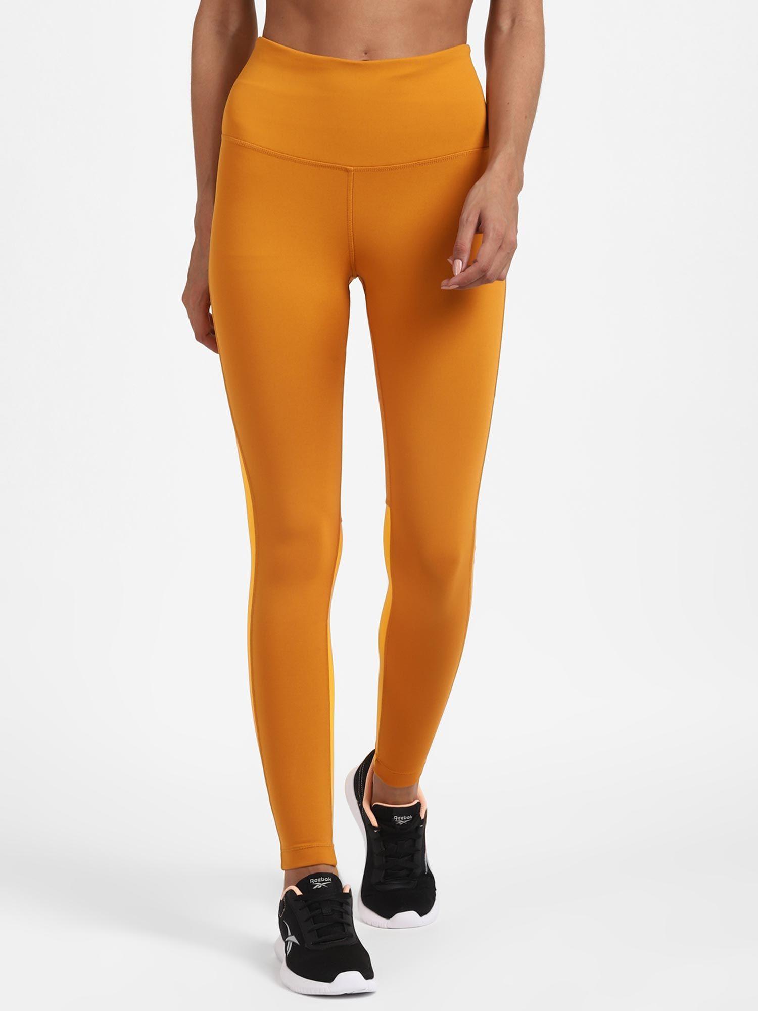 sh beyond the sweat tight mustard sports tights