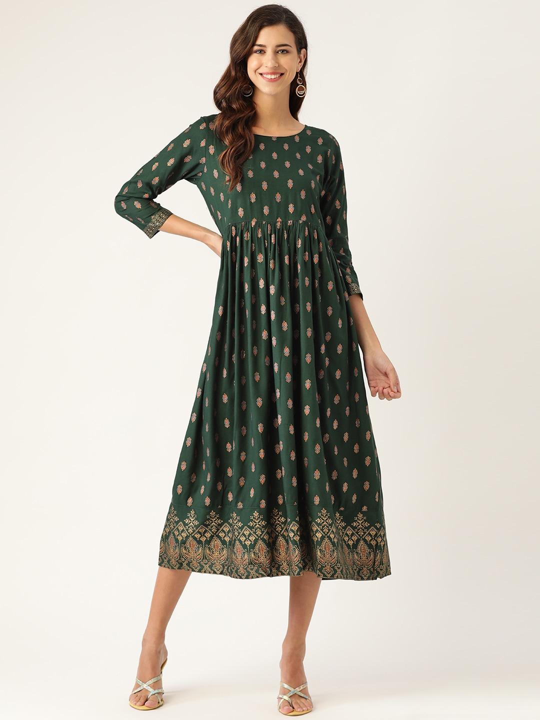 shae by sassafras green & golden ethnic motifs printed a-line midi dress