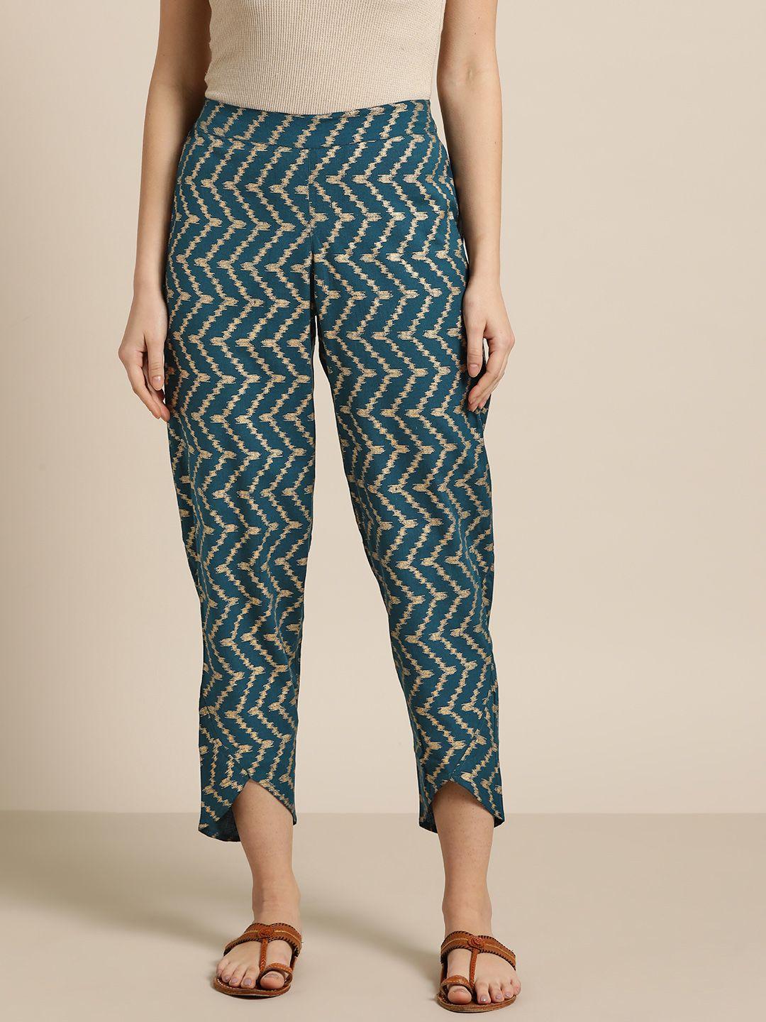 shae by sassafras women teal blue & golden regular fit foil printed tulip trousers