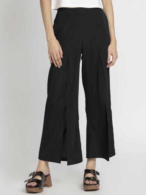 shaye black mid rise flared trousers