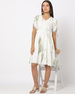 shibori print dress with tassel detail