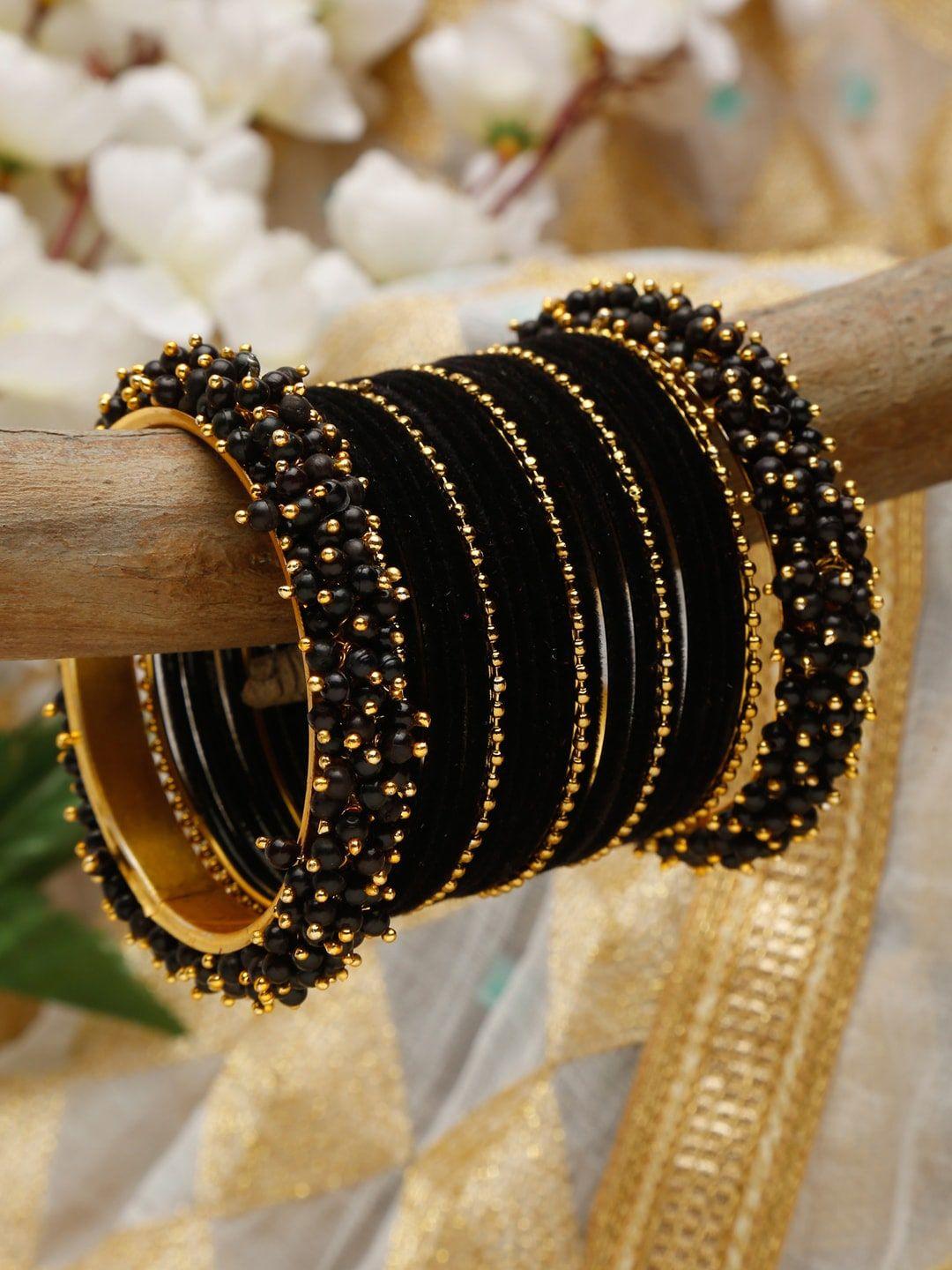 shining diva set of 23 gold-plated black beaded bangles