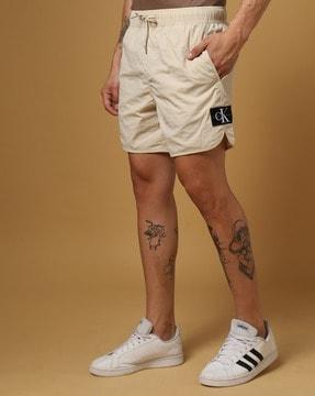 shorts with logo patch