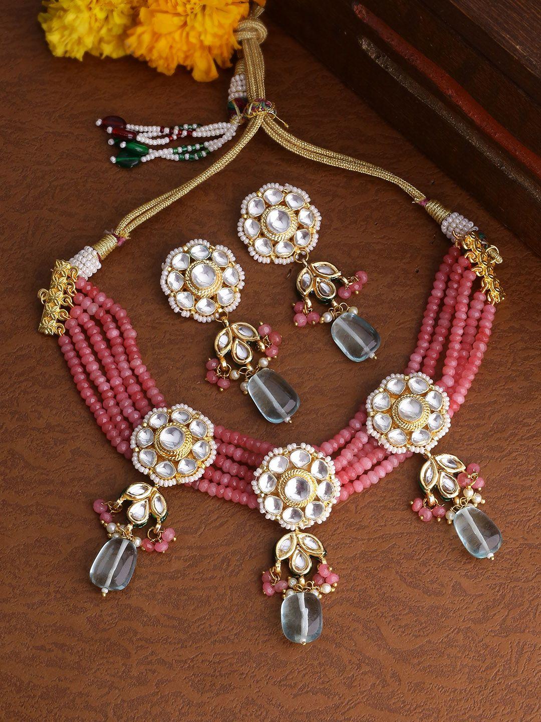 shoshaa gold-plated peach coloured & white beaded kundan jewellery set
