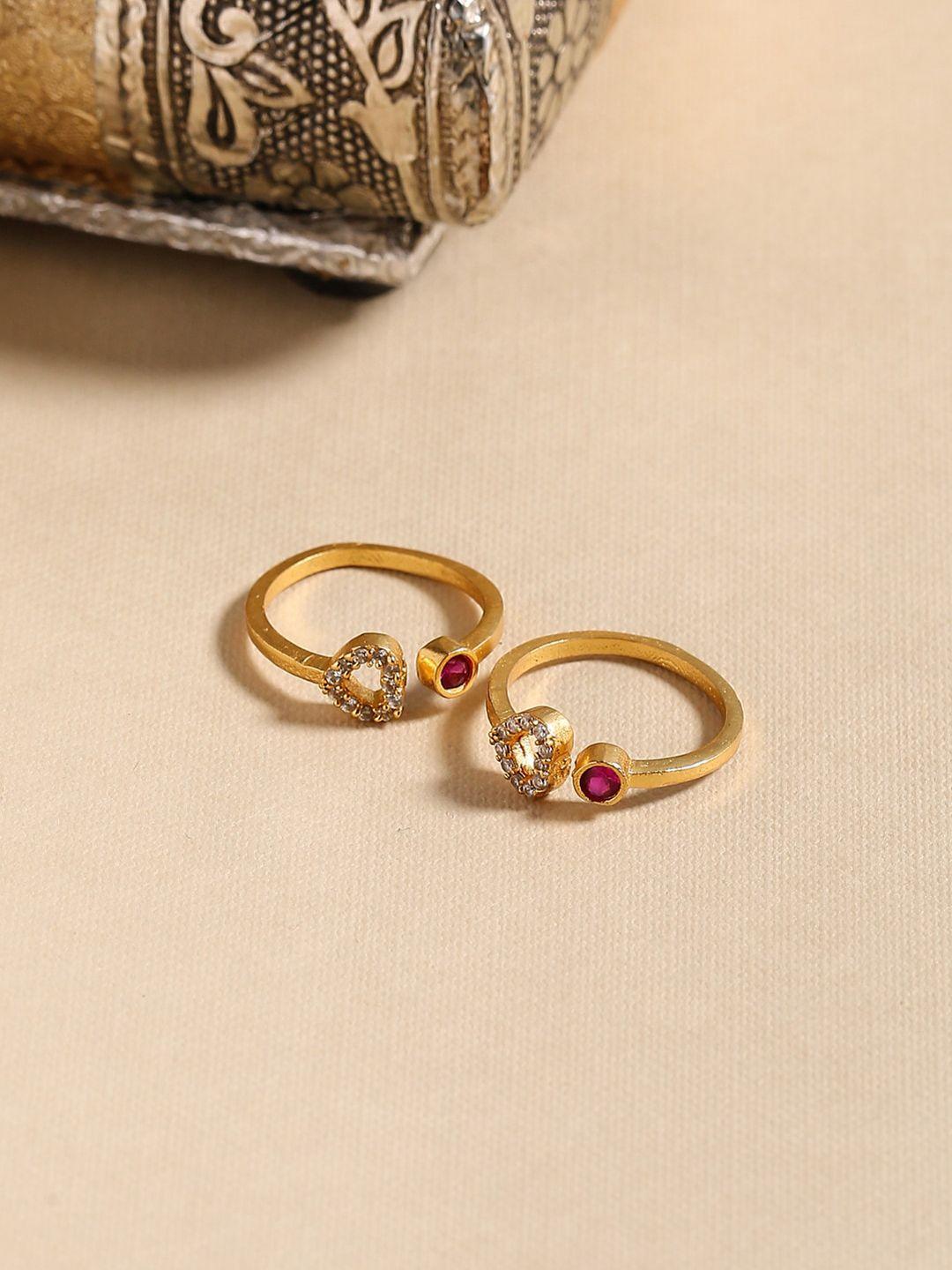 shoshaa set of 2 gold-plated pink & white stone-studded handcrafted toe rings