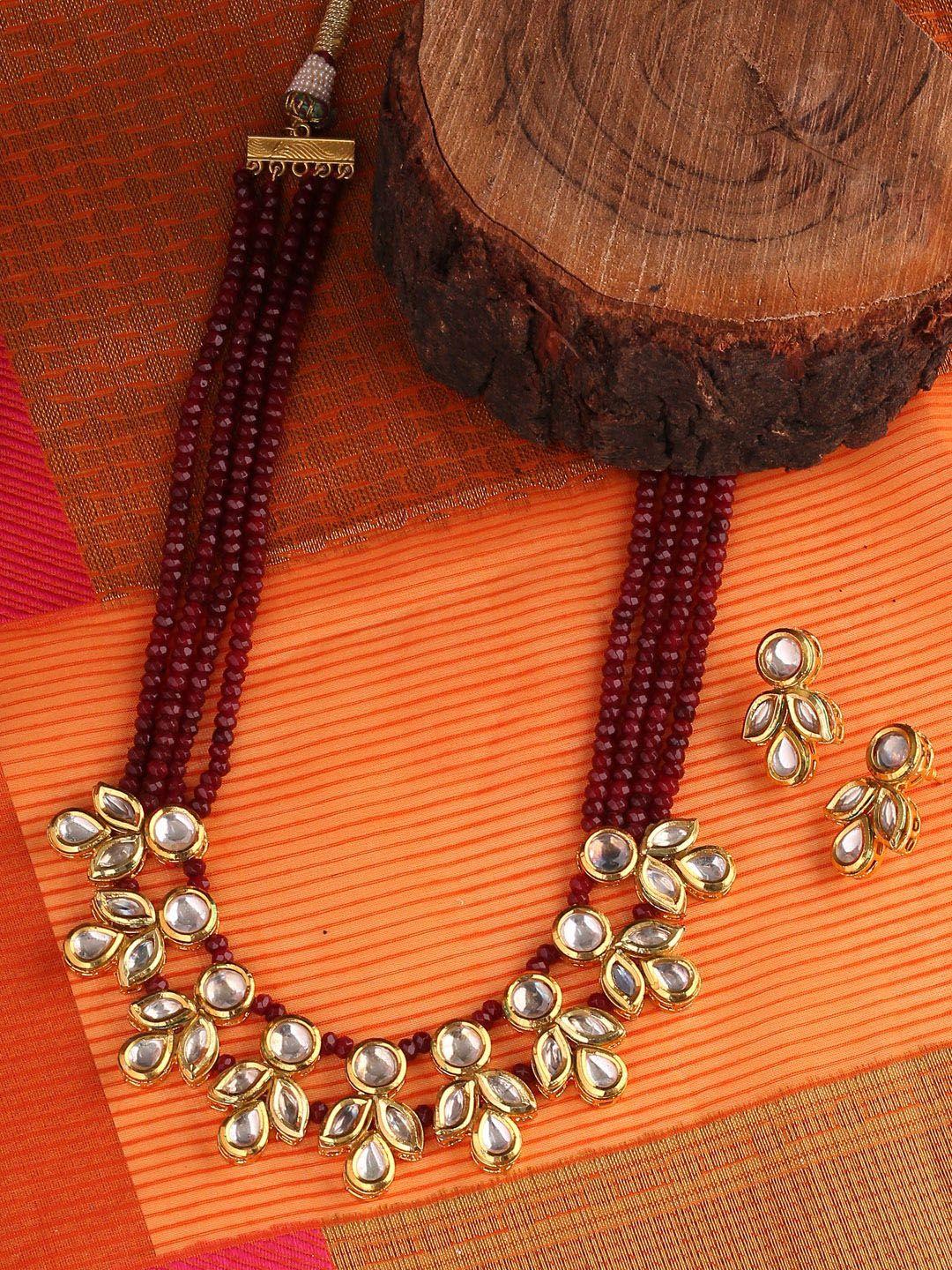 shoshaa women gold-plated & red kundan embellished jewellery set