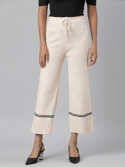 showoff beige straight fit mid rise trousers