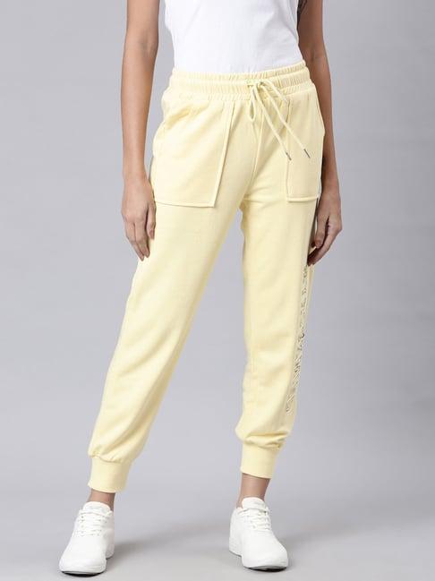 showoff light yellow cotton blend regular fit mid rise joggers