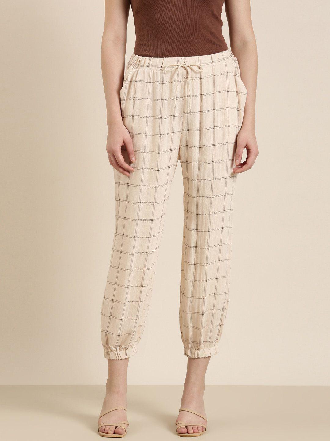 showoff women cream-coloured checked relaxed mom fit joggers trousers