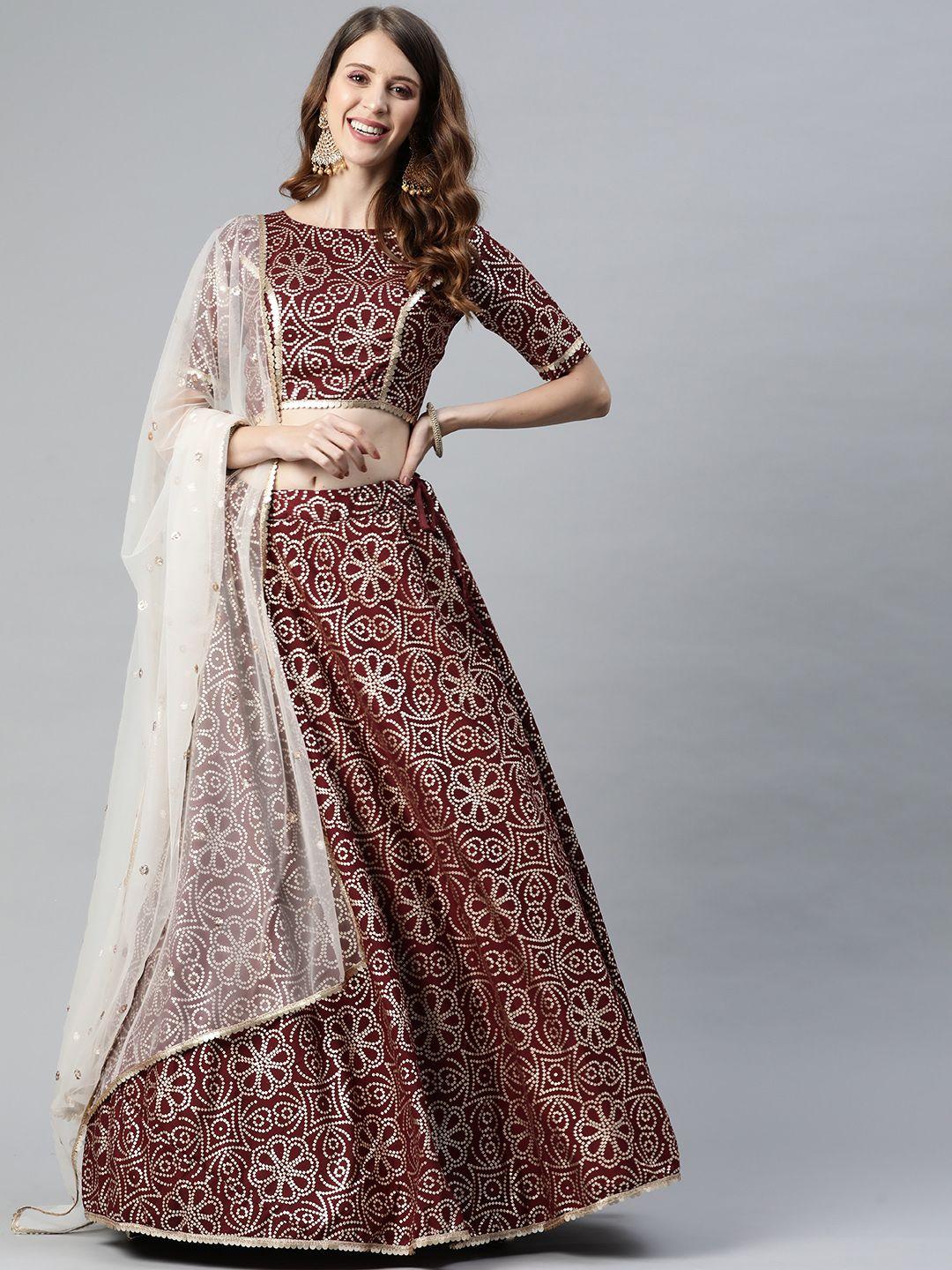 shubhkala maroon & golden foil print semi-stitched lehenga & blouse with dupatta