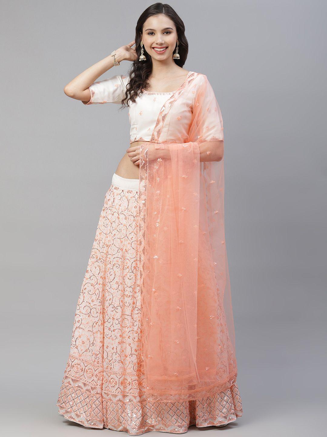 shubhkala off white & peach-coloured embellished sequinned semi-stitched lehenga & unstitched blouse with