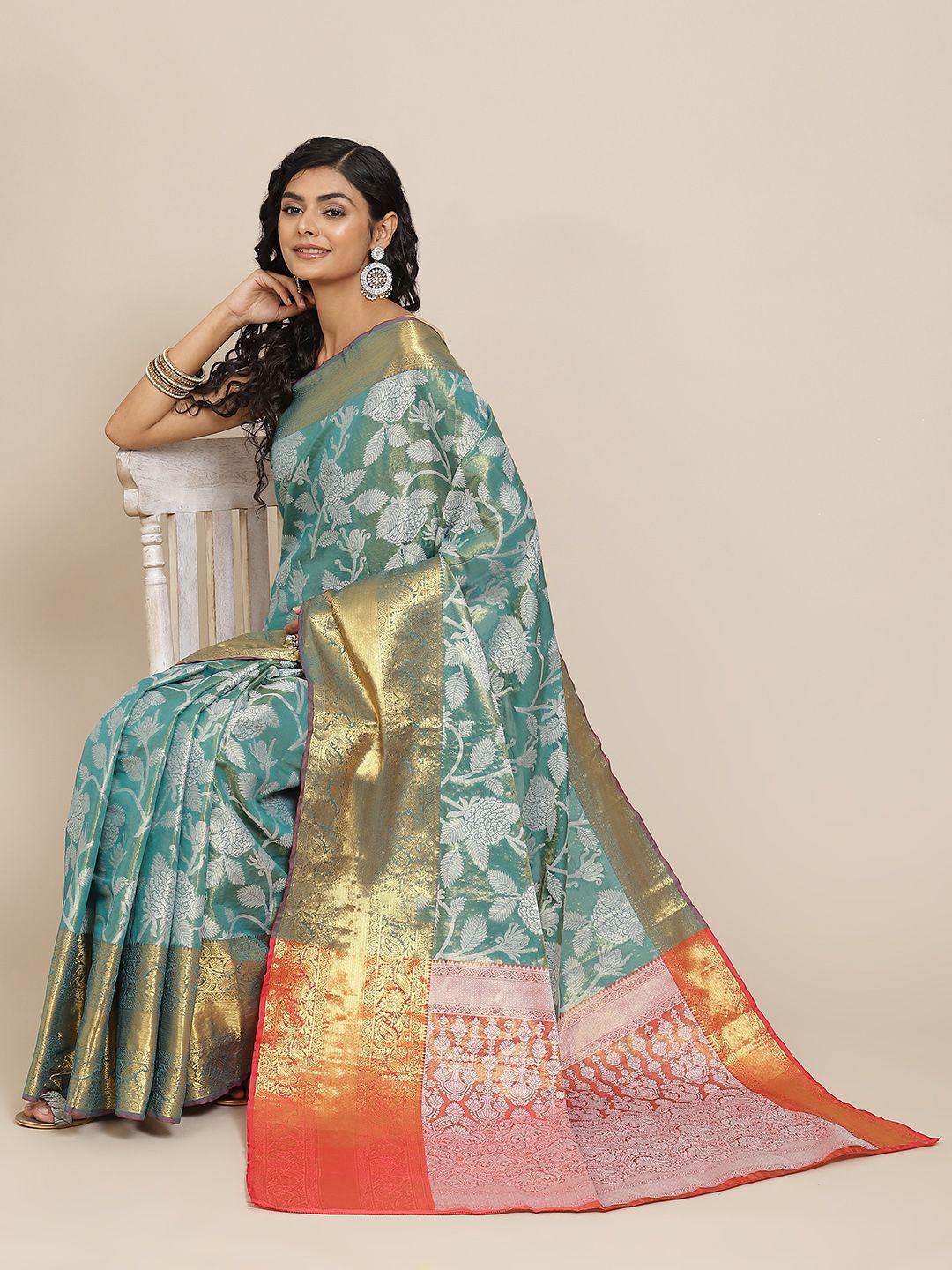 silk land teal green & coral floral zari pure silk ikat saree