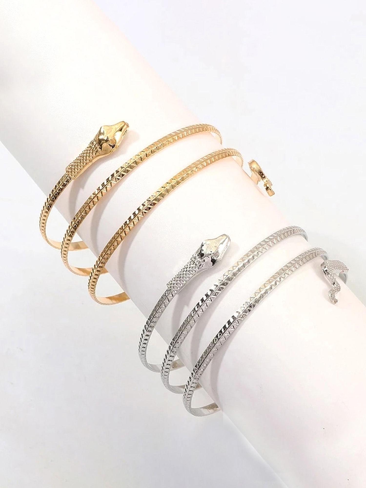 silver & gold-toned snake design bracelet