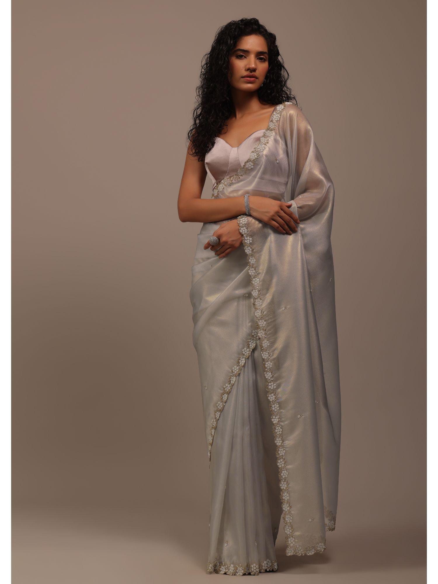 silver grey foil saree in tissue with cut dana embroidered borders with unstitched blouse