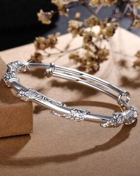silver-plated kada bracelet