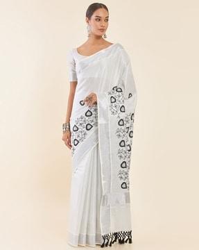 silver tissue kasavu saree with embroidered foliage designs